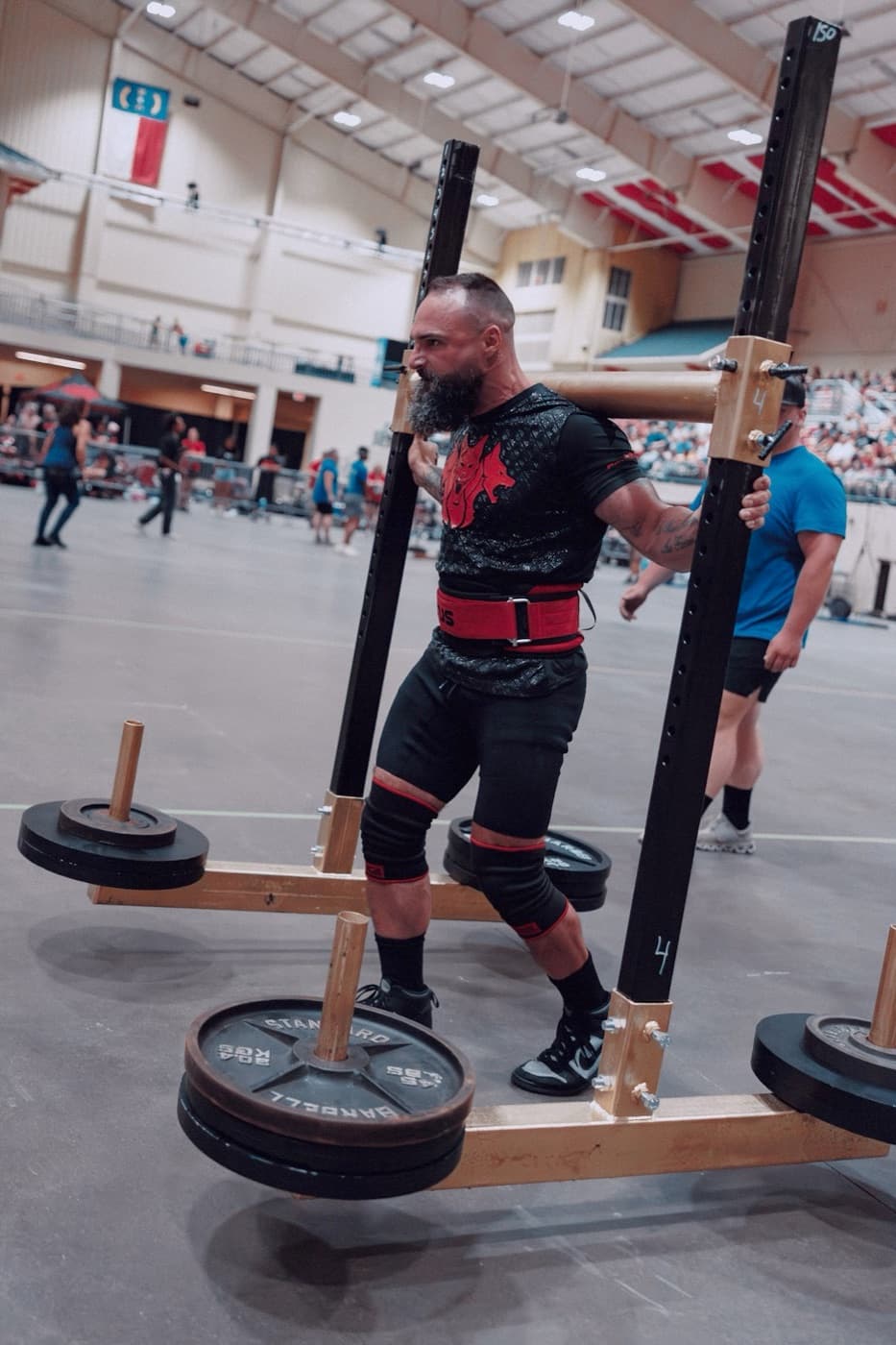 Sean driving a loaded yoke forward on the competition floor.